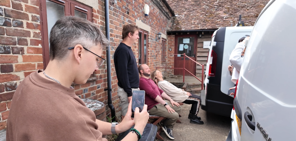 GPS Treasure Hunt Interactive Team Building Challenge people reenacting a sitting down painting