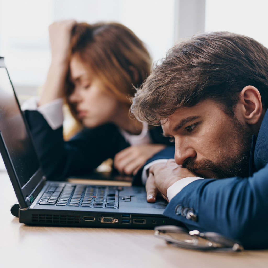 Winter Corporate Fun Day Sad Man at laptop