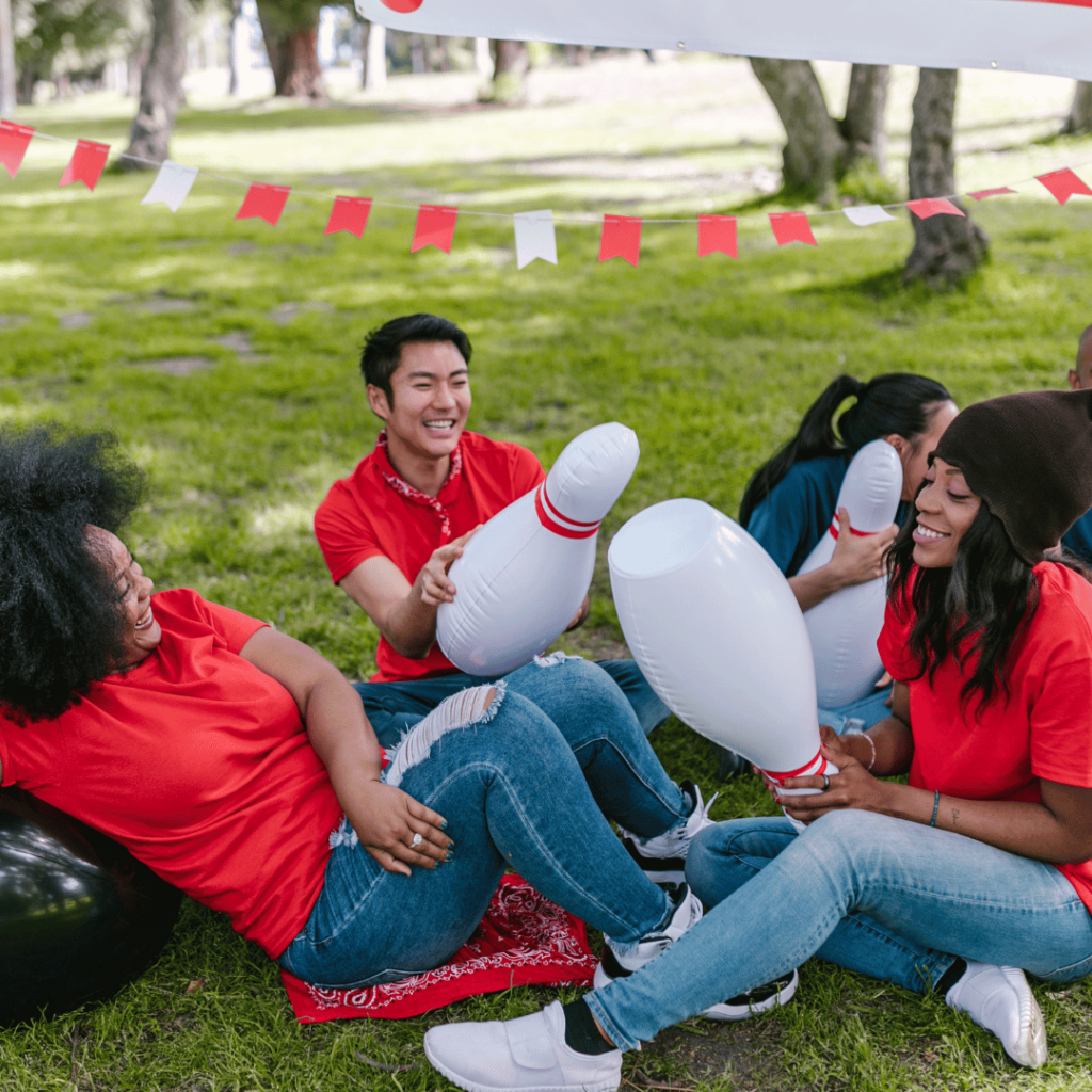 Group of Friends Participating in Unusual Team Building Activities