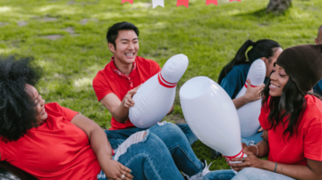 Group of Friends Participating in Unusual Team Building Activities