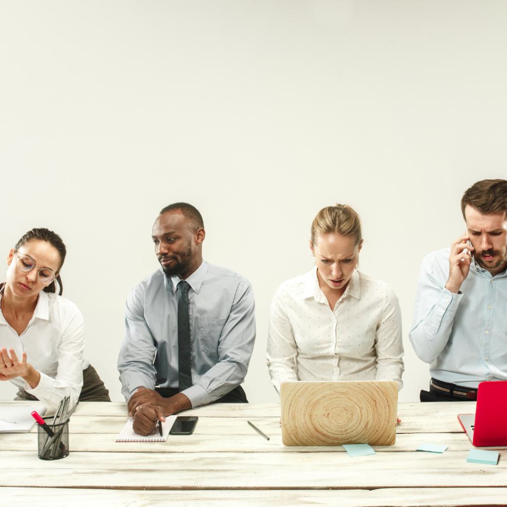 Workplace Challenges Siloed Teams. Stressed Business People at Office and Working on Laptops